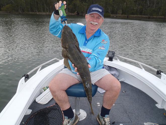 The author with a 79 cm dusky flathead that was caught while working soft plastics on a rising tide. © Gary Brown